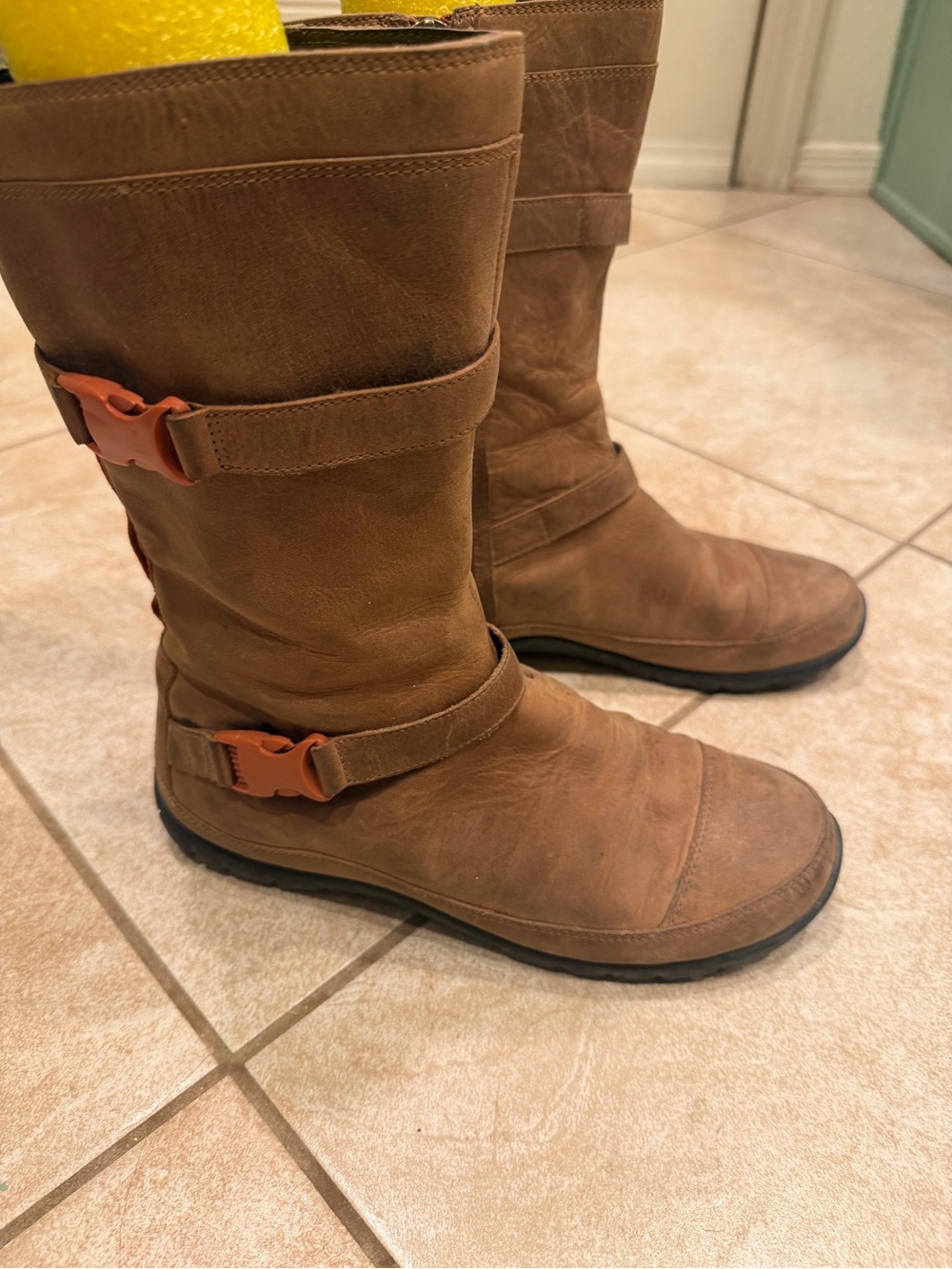 The North Face Women's Brown Leather Mid-Calf Buckle Boots with Orange Accents